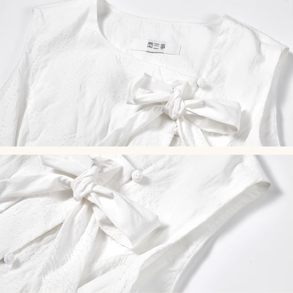 リボン装飾付きアシンメントリーペプラムトップ《Z00975》