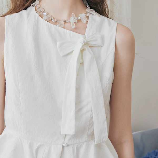 リボン装飾付きアシンメントリーペプラムトップ《Z00975》