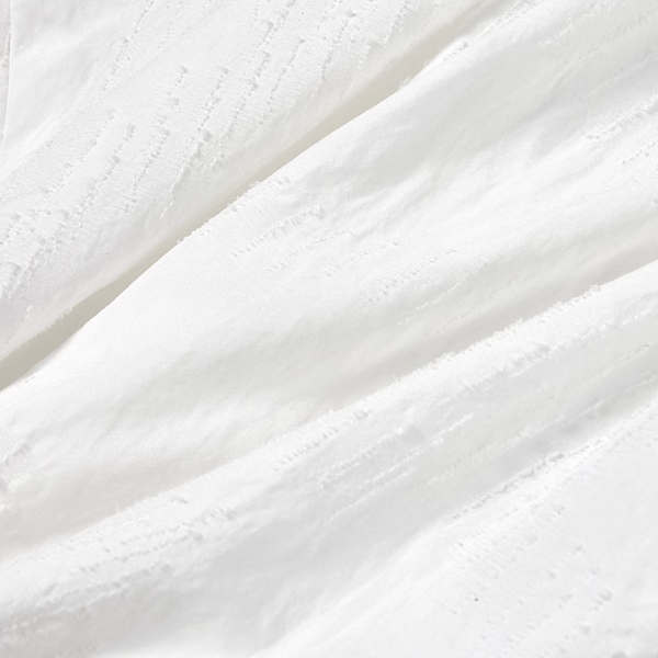 リボン装飾付きアシンメントリーペプラムトップ《Z00975》