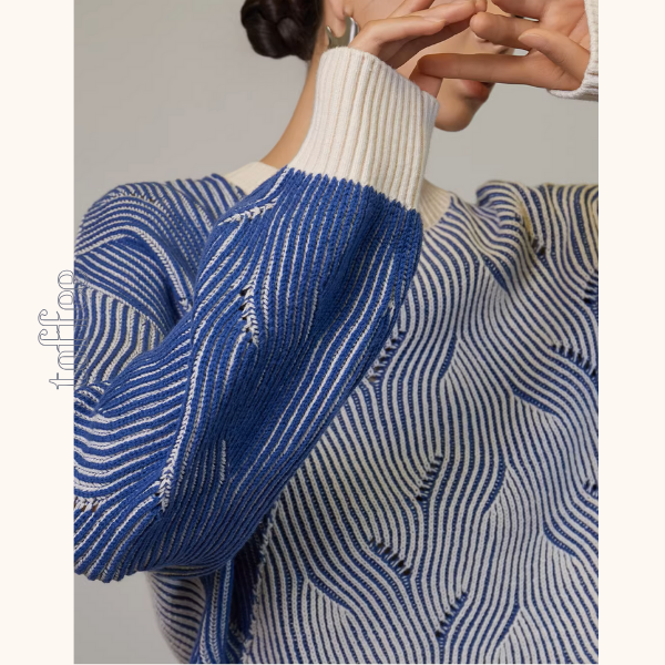 流れ柄切替のアートニットセーター《Z01245》