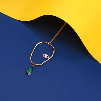 雫が揺れる＊片目モチーフのアートネックレス《Z01186》