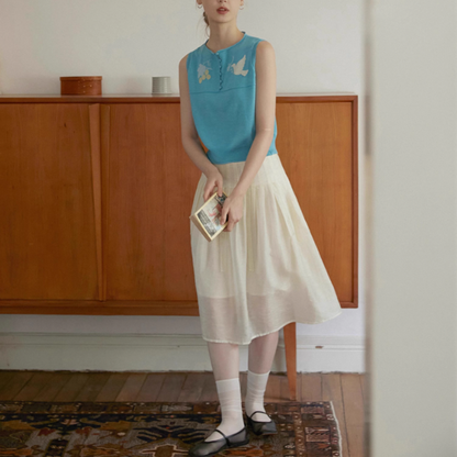 羽ばたく鳥と木の実のシアーニットベスト《Z01018》